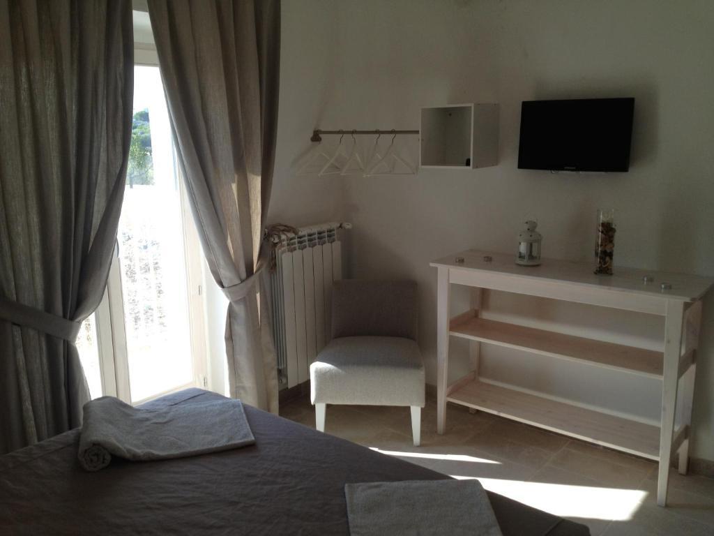 Il Granello Di Senape In Valle D'Itria Guest House โลโกโรตอนโด ห้อง รูปภาพ
